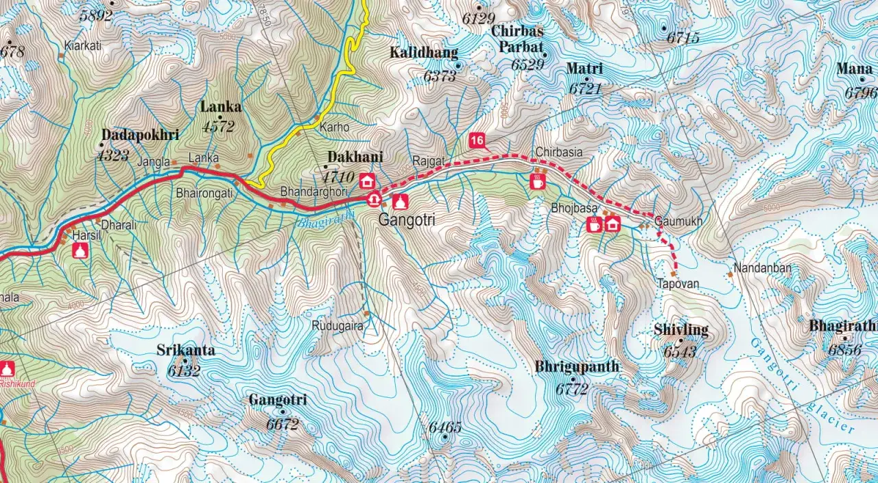 Mapa topograficzna przedstawia szczyt w Himalajach, z zaznaczonymi trasami i wysokościami, m.in. Gangotri 6672 m.
