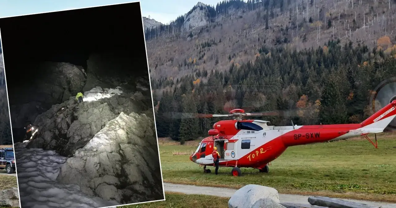 Akcja ratunkowa w Tatrach Słowackich. Ratownicy w nocy w trudnym terenie, helikopter TOPR gotowy do startu.